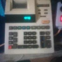 ماشین حساب شارپ و مانیتور