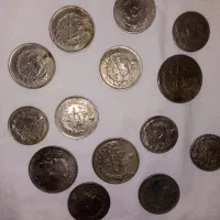 سکه رضا شاه و چراغ نفتی