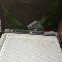 تخته رسم به همراه خط کش و گونیا و کیف