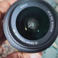 نیکون Nikon D5100 در حد نو + لنز + باتری اضافه|دوربین عکاسی و فیلم‌برداری|شیراز, شاهچراغ|دیوار