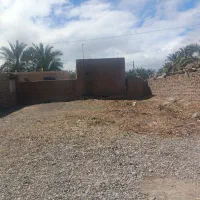 یک دهنه مغازه تجاری بر جاده اصلی بم کرمان