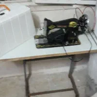 چرخ خیاطی با میز کارش