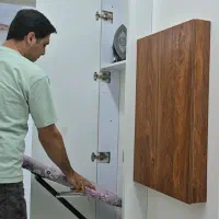 ساخت میز اتوی تو کار در کارگاه چوبکا