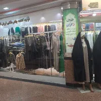 فروشنده خانم و خیاط پوشاک زنانه