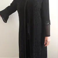 یک مانتو مجلسی وچند عدد لباس مجلسی بسیار شیک