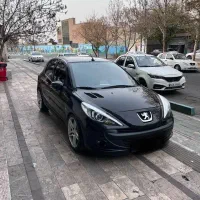 207 مدل 98 مشکی با لوازم عروسک