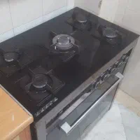 اجاق گاز 5 شعله صفحه شیشه ایی تایمر و فندک دار|اجاق گاز و لوازم برقی پختوپز|تهران, جنتآباد مرکزی|دیوار