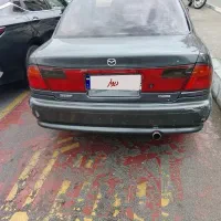 مزدا، ۳۲۳ نقد واقساط