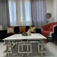 فروش مبل 9 نفره و ست میز نهار خوری 8 نفره استیل