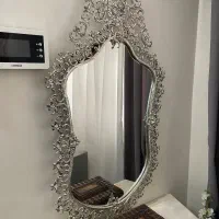 آیینه و شمعدان برنجی