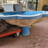 حوض بتنی و چرخ باربری