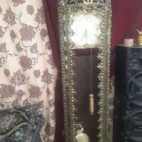 ساعت و میز و بوفه