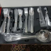 قاشق چنگال و جاروبرقی  و اجاق گاز