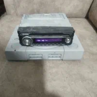 یک دست گاه سونی 1 و ضبط کنوود