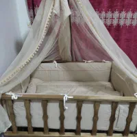 تخت کنار مادر کاملانو