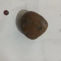 سنگ آسیاب وسنگ مشکوک به شهاب