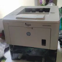 پرینتر اچ پی 203dn مشابه اکبند