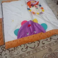 رخت‌خواب و قنداق کودک