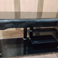 زیر تلویزیونی شیشه‌ای