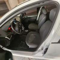 پژو 207i TU5P AT سفید 1403، 3500 کیلومتر کارکرده