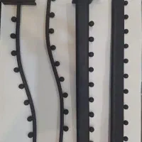 تعدادی آویز تیله ای و حلقه ای مخصوص مغازه