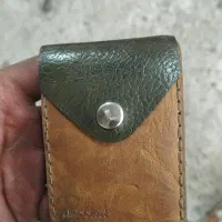 یه کیف مدارک کارت ملی وگواهینامه وکارت موتور