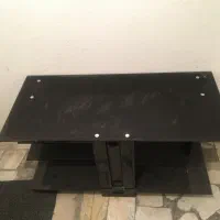 میز زیر تلویزیونی شیشه ای کاملا سالم