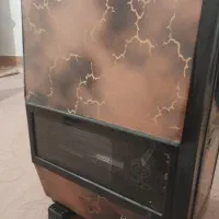 یک عدد تلفن رو میزی ب همراه بخاری