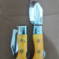 دو تا چاقو کپوری دسته استخوان پشت کار ابزار خورده