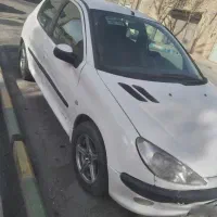 ۲۰۶مدل۸۲سفید سالم وتمیز اسپرت