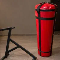 کیسه بوکس ۱۲۰ سانتی با پایه دیواریدمعاوضه ام دارم