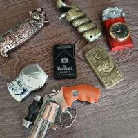 دوعدد فندک اتمی یکی عکس دلار آمریکا شعله رنگی