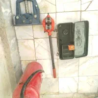 یک دستگاه حدیده مدل رکس و یک عدد کپسول آتش نشانی