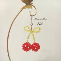 جاسوئیچی و اویز مرواریدی