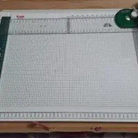 تخته رسم همراه با خط کش و گونیا