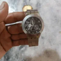ساعت دستی مردانه.  به رنگ نقره ای
