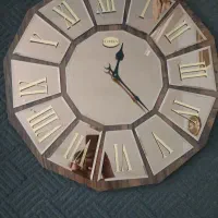 ساعت دیواری ترکیب آیینه وچوب