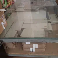 میز شیشه ای چرخ دار