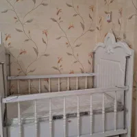 تخت نوزاد با قابلیت گهواره