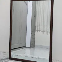 آینه دیواری با قاب چوبی