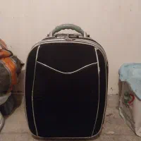 دوعددچمدان یکی مسافرتی چرخدار ویکی معمولی