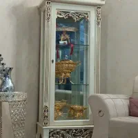 گنجه ،میز تلویزیون، ساعت.