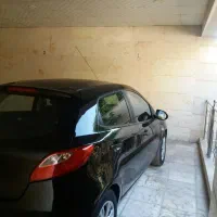 فروش سواری مزدا 2 هاچ بک اتوماتیک مشکی