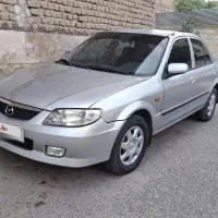 مزدا ۳۲۳ نقره ای اتومات مشابه صفر