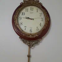 ساعت دیواری طرح چوب