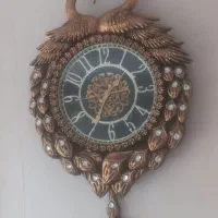 ساعت دیواری طرح طاووس