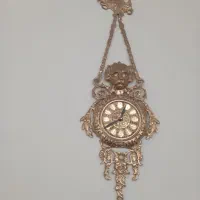ساعت دیواری برنزی