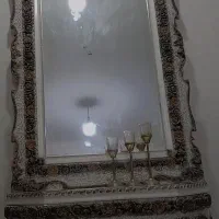 اینه کنسول و ساعت ایستاده