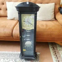 ساعت دیواری آونگ دار