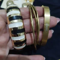 دستبند پهن زنجیر ماری گوشواره های فانتزی
